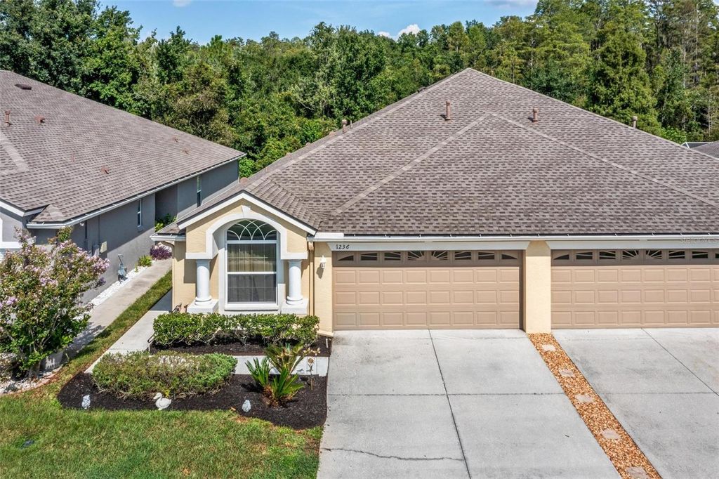 Photo of 1236 Bensbrooke Drive, Wesley Chapel, FL 33543 (MLS # TB8420468)