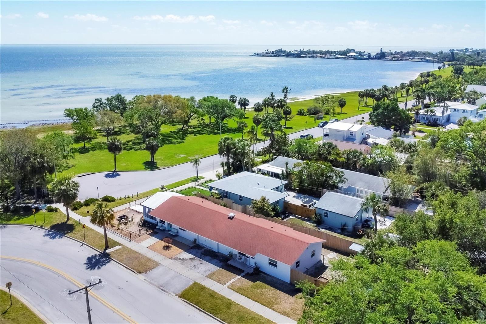 This charming duplex located on Beach Drive SE offers two 2-bedroom, 1-bath units, each with a 1-car garage, providing a rare opportunity for both homeowners and savvy investors. Positioned directly across the street from Lassing Park, you'll enjoy panoramic views of Tampa Bay from the expansive screened-in front porch—your perfect living room with breathtaking views and gentle bay breezes. Wake up to stunning sunrises over the water, setting the tone for your peaceful mornings.
Each unit is thoughtfully designed with washer/dryer hookups, and a private backyard featuring an outdoor shower, kayak/paddleboard storage, and raised flower beds—ideal for outdoor enthusiasts and gardeners alike. Located in the highly desirable Old Southeast Neighborhood, renowned for its lush landscaping, brick streets and historic charm, this property presents an unmatched opportunity for those looking to invest in a growing area.
Just a short drive or easy bike ride to downtown St. Petersburg, this duplex combines the best of both worlds: the vibrancy of urban living with the tranquility of a family-friendly neighborhood. Zoned for multi-family use, this property offers significant potential for the savvy investor. Don’t miss out on this unique opportunity to own a piece of paradise!
THIS PROPERTY WAS NOT AFFECTED BY HURRICANE HELENE (FLOOD) NOR HURRICANE MILTON (WIND).
