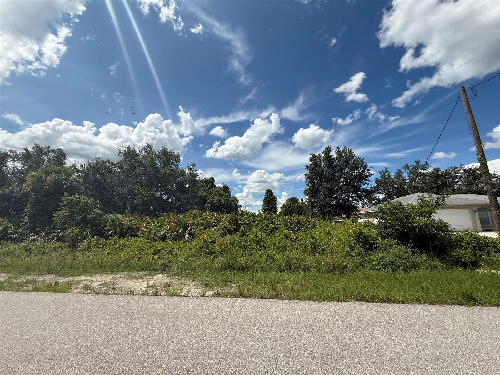 Don't miss the chance to own this beautiful 0.24-acre lot, ideal for building your dream home. With no HOA or deed restrictions and not located in a flood zone, this property is conveniently situated near US 41 and I-75. It offers close proximity to schools, shopping, dining, hospitals, beaches, and golf courses, making it an ideally located property. Plus, it's just a short drive to stunning beaches! FOR DIRECTIONAL PURPOSES PLEASE USE 2142 ALLIANCE