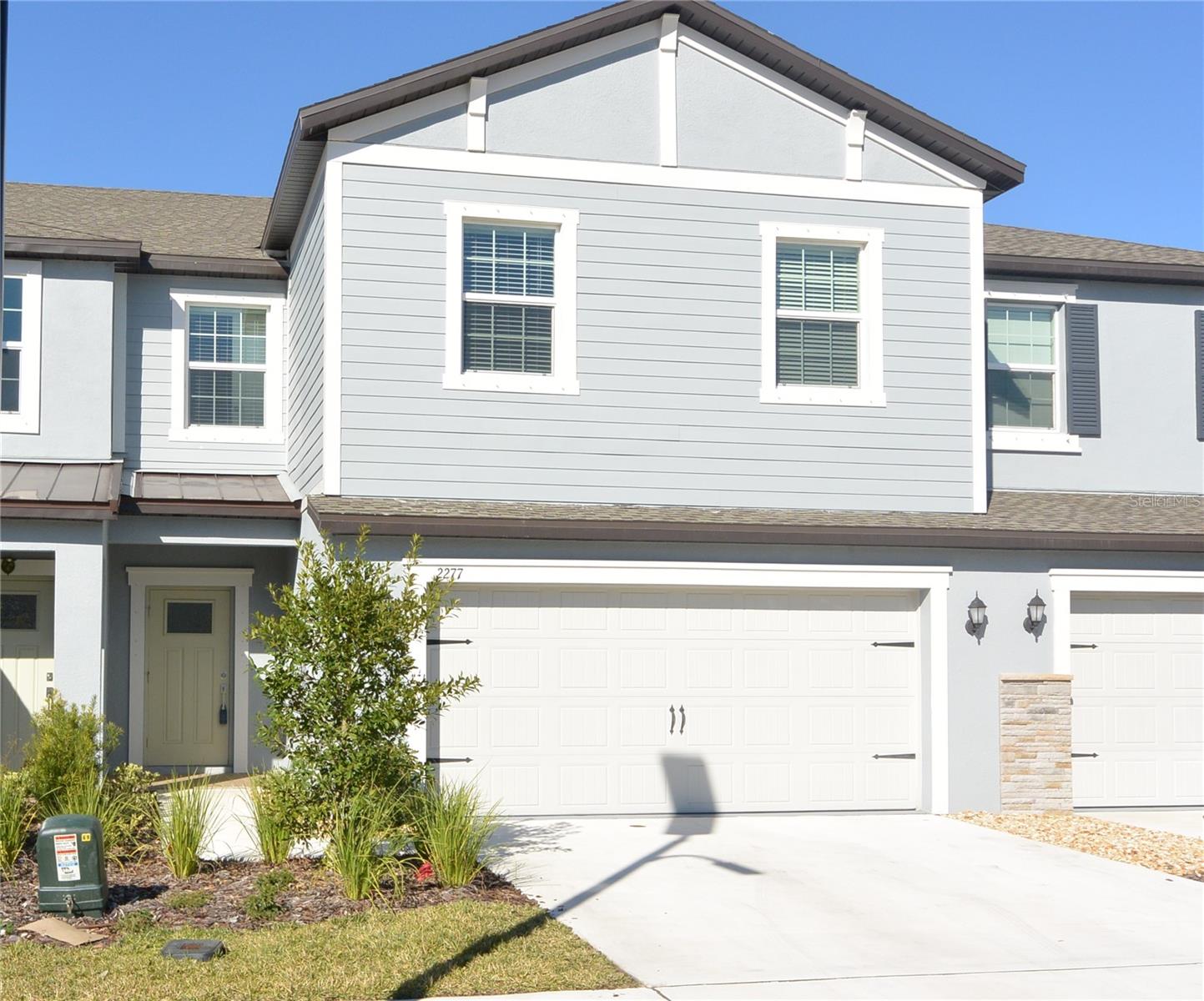 NEWER TOWNHOME in the desirable Cypress Range community! This 3 bedroom 2 ½ bath, 2 car garage townhome features an open floor plan with the kitchen overlooking the spacious great room. The dining room will accommodate a large table and has easy access to the covered lanai where you can relax and enjoy views of a picturesque park like setting. The kitchen includes modern white staggered height cabinets, NEW stainless appliances, and an abundant amount of counterspace. The 2nd floor has a loft area that is the center of the bedrooms that can be used for whatever suites your needs. The owner suite is very large with a huge walk-in closet and a master bath with plenty of cabinet and counter space with dual sinks and a separate garden tub and shower. The WATER is included along with the WASHER/DRYER for your convenience. Schedule a showing today!!!!