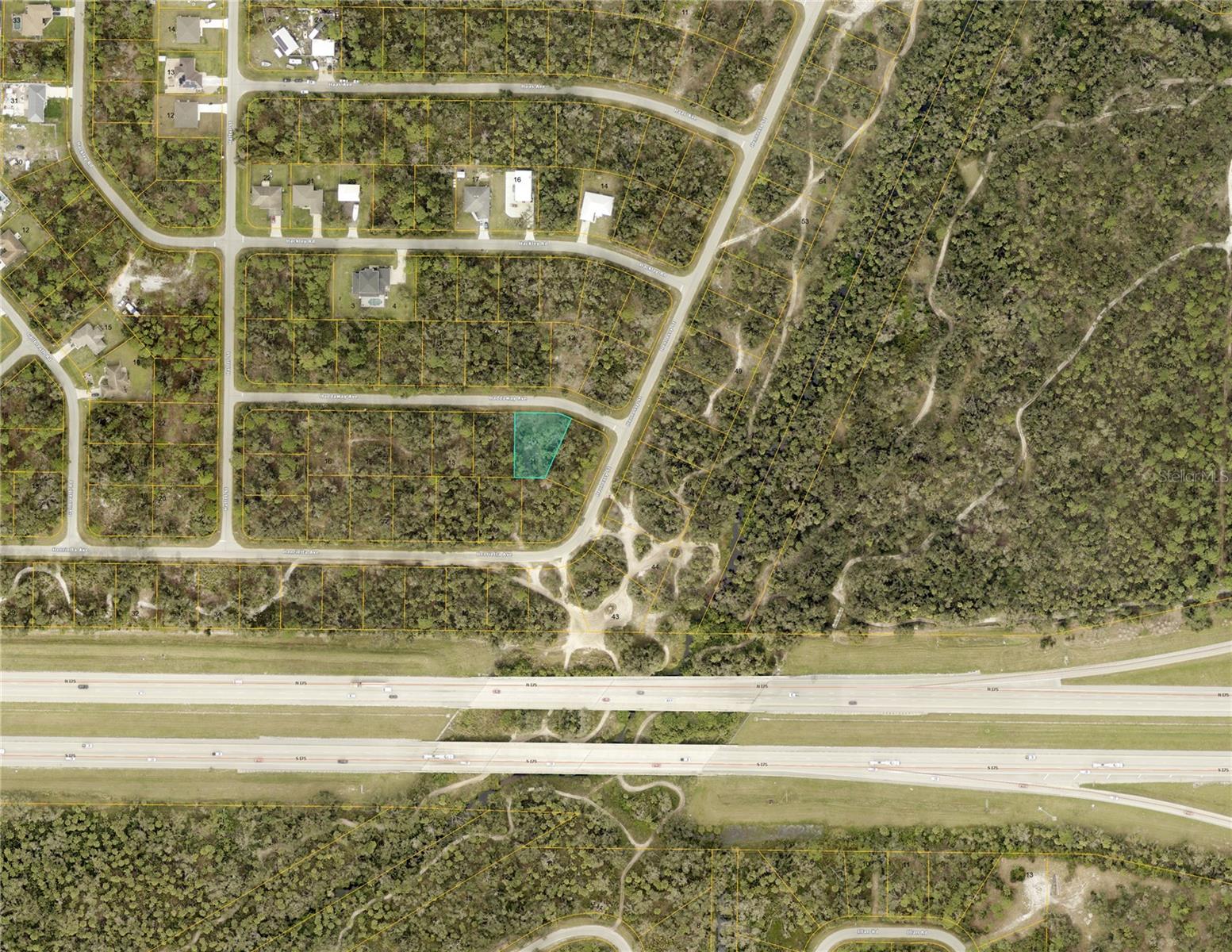 Discover the perfect opportunity to build your dream home on this prime 0.25-acre vacant lot located on Haddaway Ave in the thriving city of North Port, Florida! This parcel offers a blank canvas for your custom residence in a rapidly growing community. One of the standout features of this location is its proximity to the site of the new Sarasota Memorial Hospital, soon to be constructed nearby, enhancing convenience and boosting property values in the area.
Nestled in a peaceful residential neighborhood, this lot is just minutes from North Port’s expanding amenities. Enjoy easy access to I-75 and US-41, connecting you to Sarasota, Port Charlotte, and beyond. The surrounding area is brimming with attractions—shop at the Publix Shopping Plaza, dine at local restaurants, or explore the natural beauty of Warm Mineral Springs and Myakka State Forest, all within a short drive. For beach lovers, Englewood Beach and Venice Beach are just minutes away, offering sun-soaked days on the Gulf Coast. Golf enthusiasts will appreciate the multitude of world-class courses nearby, while families can take advantage of the North Port Aquatic Center and top-rated Sarasota County schools.
With no HOA or deed restrictions, you have the freedom to design and build the home you’ve always envisioned. North Port is one of Florida’s fastest-growing cities, known for its affordability, abundant land, and proximity to both urban conveniences and outdoor recreation. Don’t miss your chance to invest in this up-and-coming area. Secure your piece of paradise today—build now or hold for future appreciation!