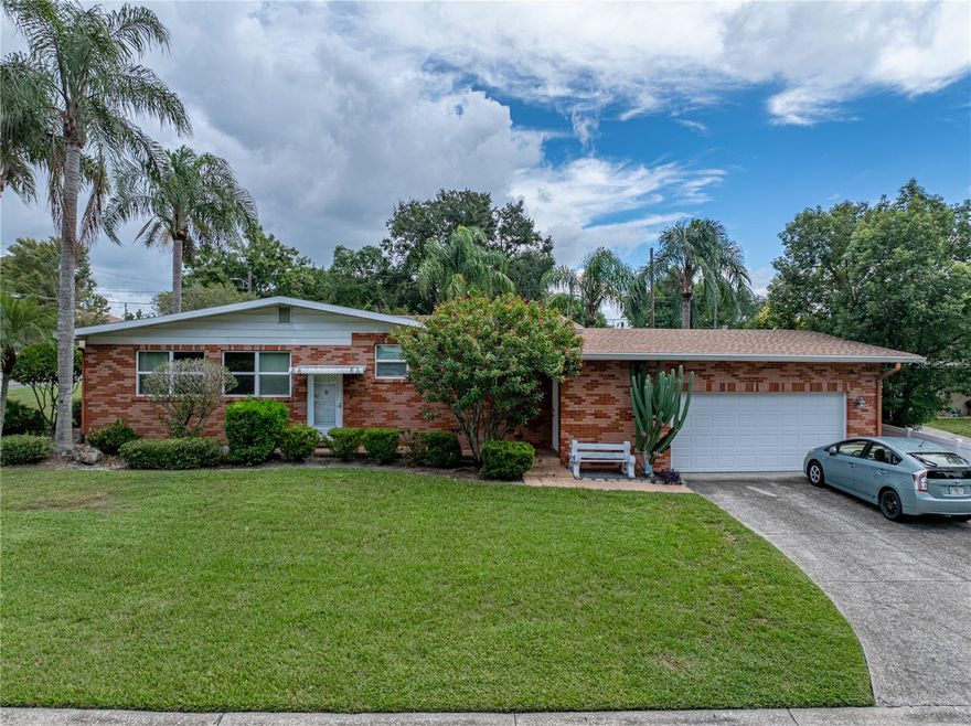 Welcome to this well-maintained 3 bedroom, 3 bathroom home situated on a corner lot with no HOA. The home features beautiful hardwood floors in the living room and dining room and an updated kitchen. The bathrooms inside have updated cabinets.  The primary bedroom has a full bath with double sinks and shower.  The second bedroom has a shared half bathroom with toilet/sink and sliding door access to the shared second bathroom that is accessed from the hall for guests and third bedroom.  The oversized garage offers additional room for storage or a workshop it also has a separate room for the laundry.  There is also a partial bath (toilet and shower) for convenient clean up after a weekend project.
Enjoy outdoor living in the fenced backyard, perfect for relaxing or entertaining. Recent updates include a roof replacement in 2025 and updated hot water heater and windows providing added peace of mind.  It is conveniently located near shopping, dining, and close to Polk Parkway for commuting to Tampa or Orlando.    Close to Cleveland Heights Golf Course and Lakeland Tennis Courts.  This home combines comfort, style, and functionality in one perfect package.  Schedule a showing today and make this house your home.