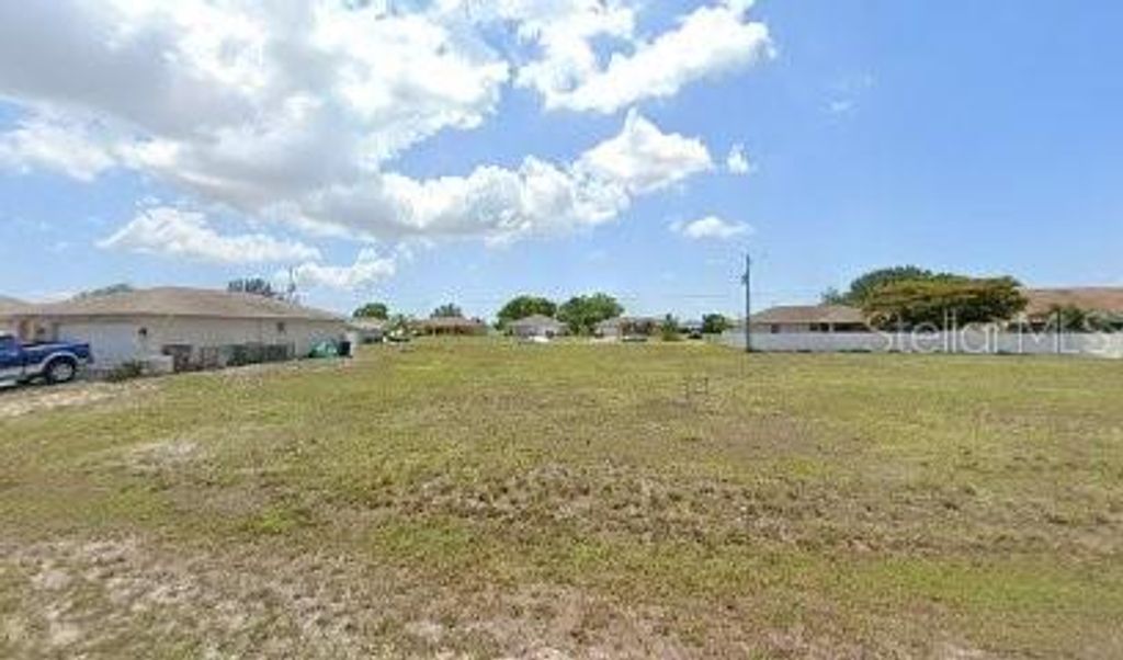 Photo of 2026 NE 10th Avenue, Cape Coral, FL 33909 (MLS # C7520553)