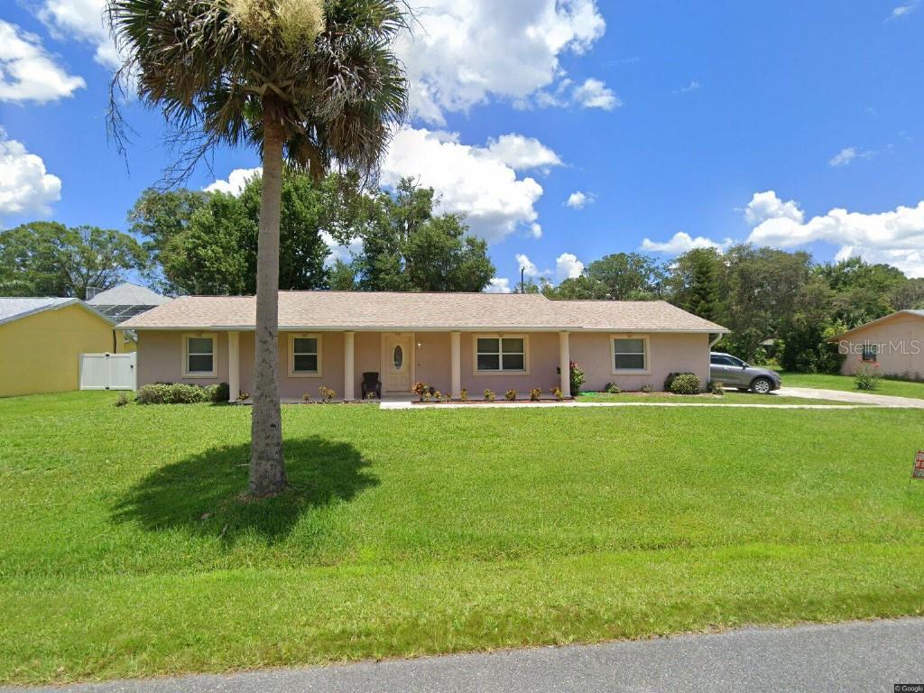House sits on 3 large high and dry lots.