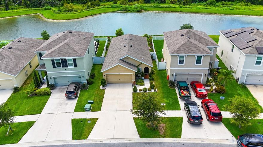 Step into this beautifully maintained, move-in-ready lake home and experience the perfect blend of comfort, charm, and community. Start your mornings with coffee in your lush backyard garden while taking in peaceful lake views and end your day with some of the most breathtaking Florida sunsets.This spacious 3-bedroom, 2-bathroom home offers the ideal layout for both relaxation and entertaining. With no rear neighbor and fully fenced in you will have full privacy. Centrally located just off Highway 301, you're minutes from the area's best shopping, dining, and entertainment. Plus, with easy access to I-75, you're perfectly positioned between Tampa and Sarasota for weekend getaways, beaches, and all the excitement of city living. The current owners will deeply miss the sense of peace that fills this home, the breathtaking views from their screened in patio, and the kindness of the neighbors who make this community so special. South Fork Lakes community isn’t just a neighborhood it’s a lifestyle. Known for its vibrant holiday celebrations, golf cart parades, and festive spirit, this community truly feels like family. From Halloween haunted houses to magical Christmas displays, there’s something here for everyone.Enjoy an active, outdoor lifestyle with scenic walking trails, a resort-style pool overlooking the lake, and plenty of green space for play and relaxation. Whether you're looking for a peaceful retreat or a place to connect, this home and community deliver it all.Don’t miss your chance to own a piece of paradise schedule your private tour today! Ask about the Down Payment assistance Program available.