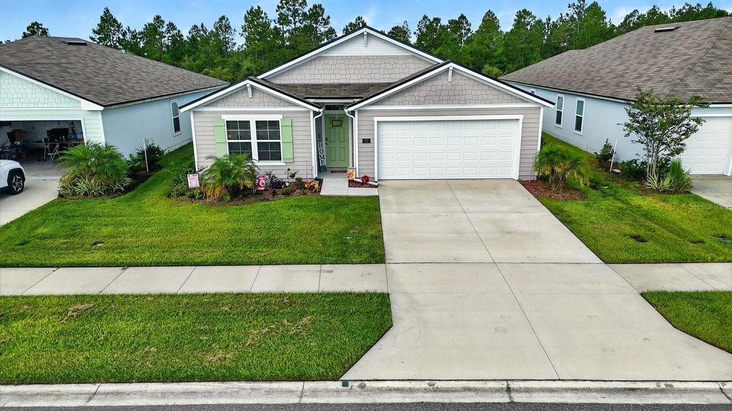 Photo of 21 Summerwood Road S, Palm Coast, FL 32137 (MLS # FC311813)