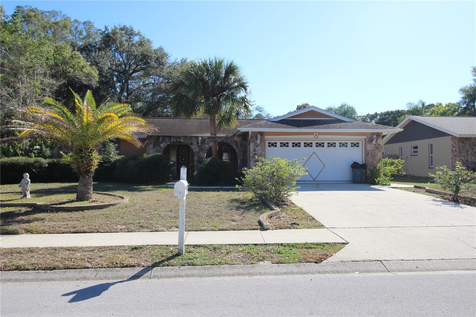 Well maintained 3 bed/2 bath/2 car garage home centrally located in the Rustic Oaks community in Palm Harbor. This 3-bedroom home features stainless appliances in the kitchen, inside laundry room with washer and dryer and laminate & tile flooring throughout (no carpeting). Split floor plan, the primary bedroom has a walk in closet and en-suite bathroom and other 2 bedrooms share a bathroom. There is a screen enclosed lanai and a large fully fenced yard. Located in a highly rated school district and available for immediate occupancy. First Month, Last Month & Security Deposit required. Max 2 Dogs allowed with non-refundable pet deposit of $200/dog.