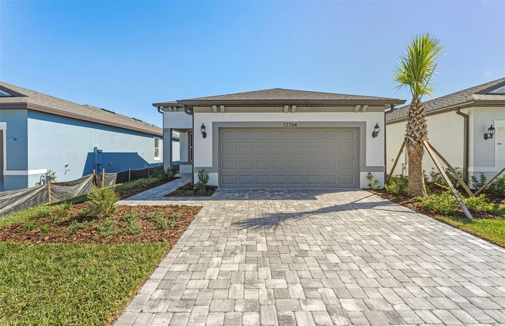 Photo of 13764 Rocky Pine Place, Spring Hill, FL 34610 (MLS # TB8429546)