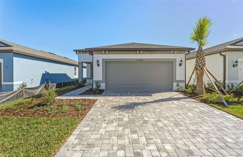 Photo of 13764 Rocky Pine Place, Spring Hill, FL 34610 (MLS # TB8429546)