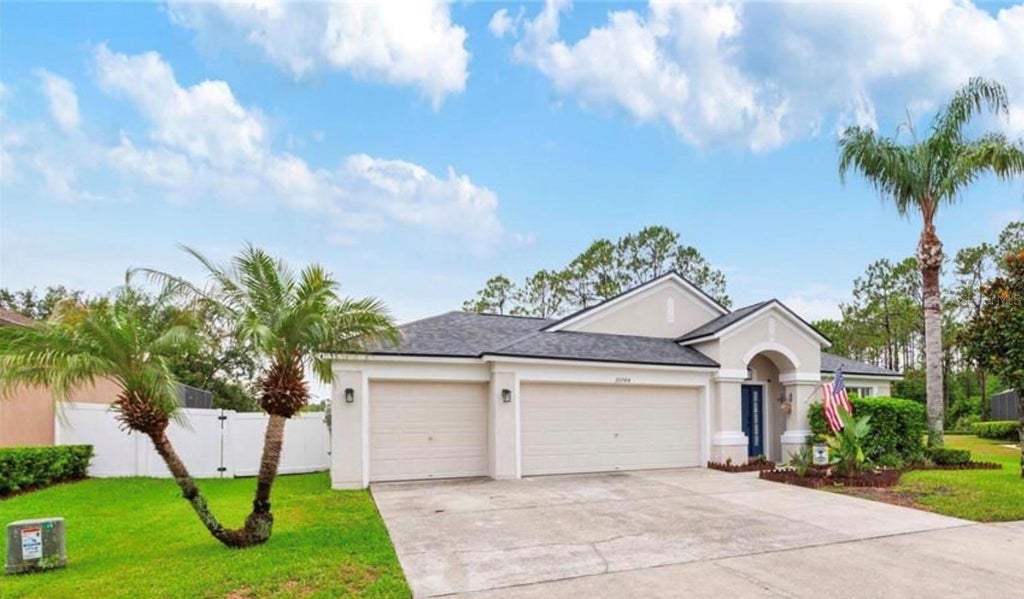 Photo of 20744 Orchardtown Drive, Land O Lakes, FL 34638 (MLS # TB8520727)