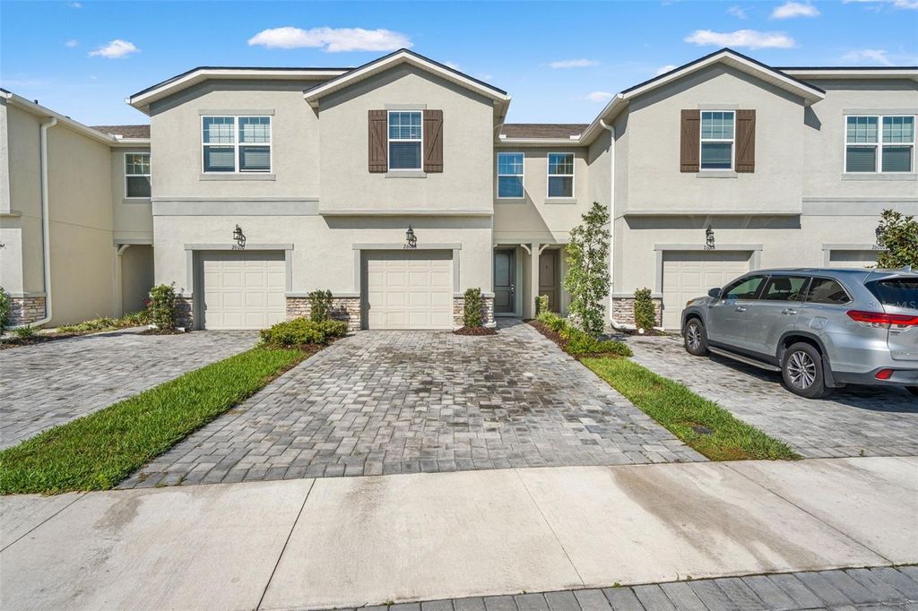 Photo of 26008 Woven Wicker Bend, Lutz, FL 33559 (MLS # TB8487100)