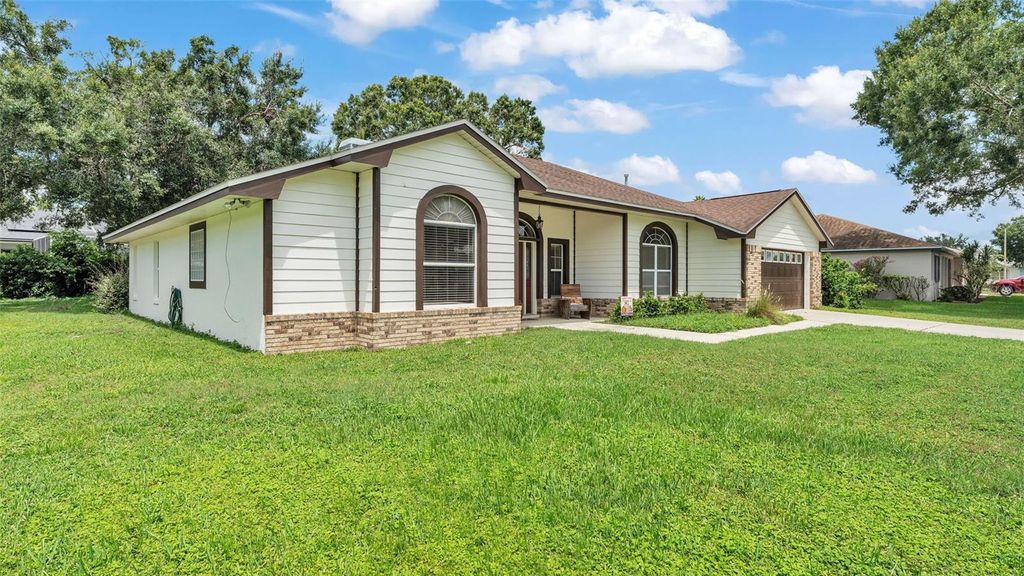 Photo of 115 Lake Mariam Way, Winter Haven, FL 33884 (MLS # B4902031)