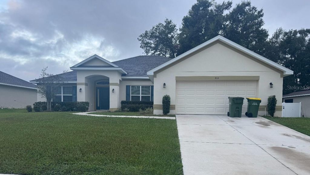 Photo of 333 Ashton Woods Lane, Leesburg, FL 34748 (MLS # O6342362)