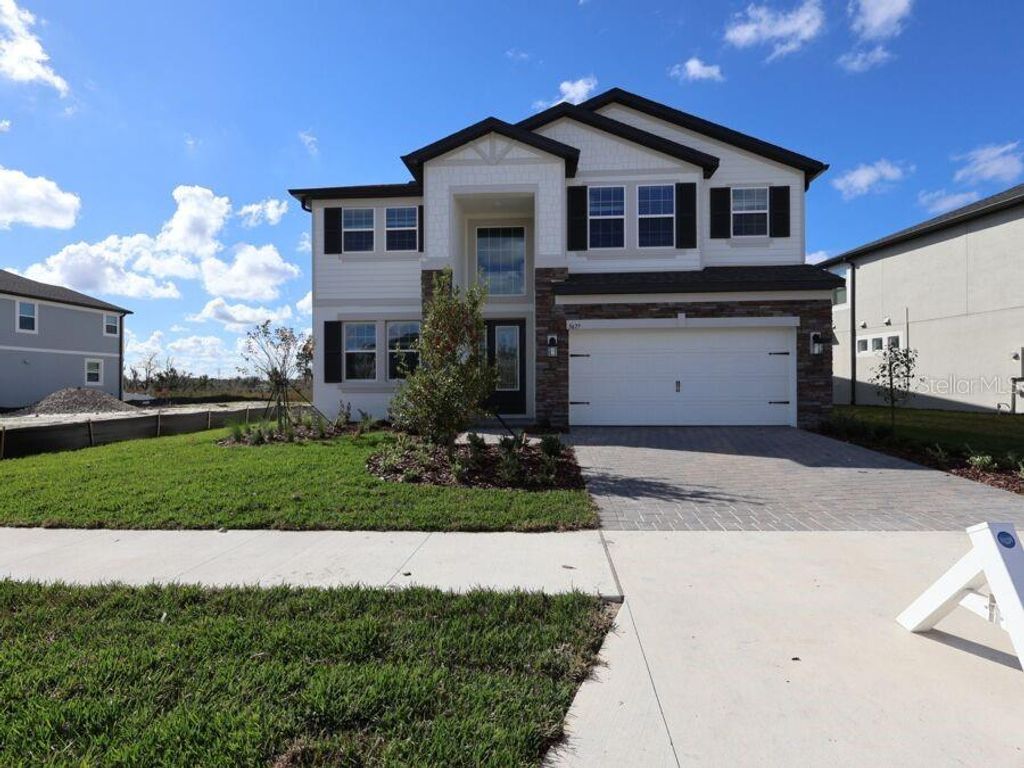 Photo of 5677 Maydale Ave, Wesley Chapel, FL 33545 (MLS # J997251)