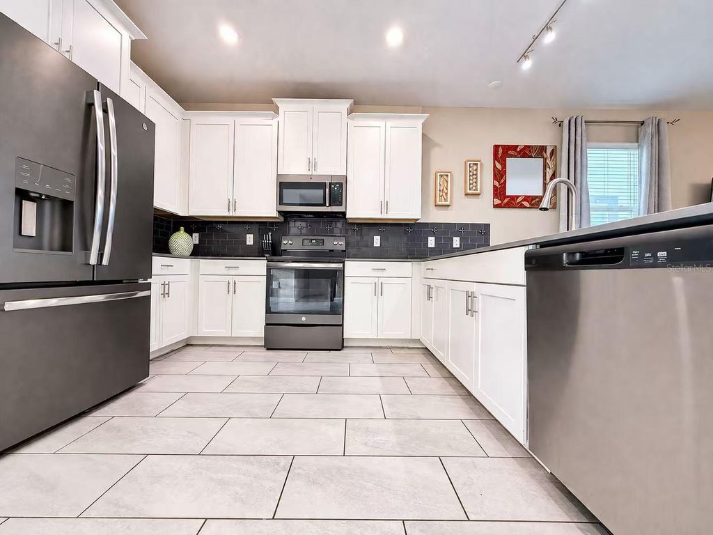 Photo of 691 Sticks Street, Davenport, FL 33896 (MLS # O6400048)