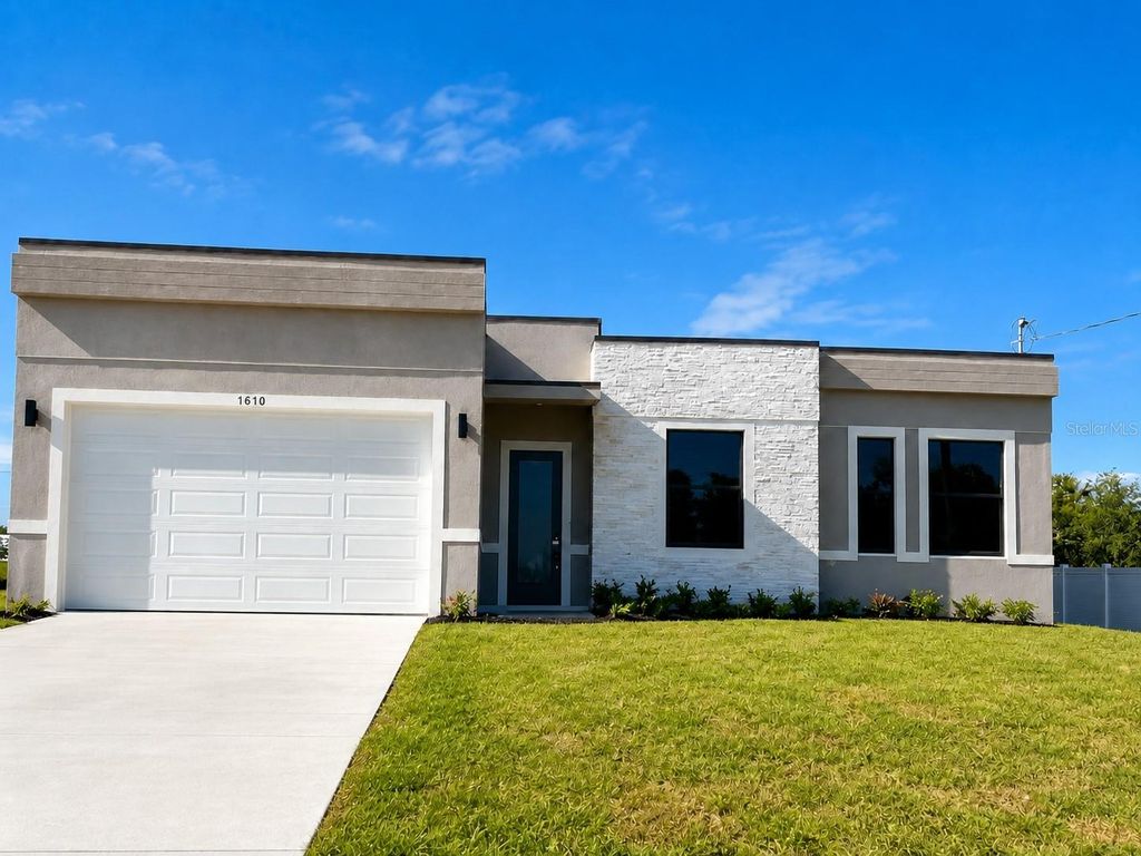 Photo of 1610 NE 34th Street, Cape Coral, FL 33909 (MLS # O6424899)