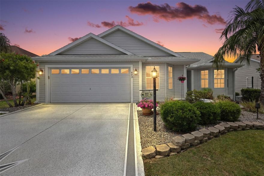 FANTASTIC, TURNKEY 3/2 Designer Wisteria featuring a GLASS-ENCLOSED 240sf LANAI with MINI-SPLIT and a REAR PAVER PATIO nestled on a CUL-DE-SAC road in the highly sought after Village of Mallory Square! - IDEALLY LOCATED “Between the 6’s” - JUST MINUTES to LAKE SUMTER LANDING with shopping, dining, and live nightly entertainment! LOW BOND - only $6,146.60. ROOF (2023) HVAC (2017) Welcoming you into this INCREDIBLE home are DECORATIVELY PAINTED drive and walkways, TROPICAL landscaping with TIERED hardscaping, and LOW-MAINTENANCE STONED planting beds. Enter through the covered vestibule with storm door and sidelight into a GENEROUS inviting foyer. The AMAZING kitchen is a chef’s dream, with crisp WHITE cabinetry, PULL-OUT drawers, NEUTRAL countertops, and an inviting EAT-IN bar. Extended cabinets spill into the dinette, offering a built-in PANTRY and an abundance of storage. The adjacent dinette, highlighted by a bright BAY window, offers a charming space for casual meals filled with NATURAL LIGHT. The OPEN-CONCEPT living and dining areas showcase soaring VAULTED ceilings that enhance the home’s bright and airy feel while beautiful LUXURY PLANK flooring adorns the dining room. From the living room, sliding glass doors open to an EXPANSIVE GLASS-ENCLOSED LANAI featuring TILE flooring and a MINI-SPLIT for year-round comfort. This INCREDIBLE retreat adds approximately 240 square feet of versatile living space, perfect for relaxing, entertaining, or simply enjoying the Florida lifestyle in any season. An exterior door leads to the REAR PAVER PATIO - an ideal setting for grilling, outdoor dining, or unwinding in the fresh air. The primary suite features DOUBLE windows and a generous WALK-IN closet. Its en-suite bathroom includes TILE floors, WHITE cabinetry with NEUTRAL top, DOUBLE sinks, and a ROMAN-STYLE TILED WALK-IN shower. A SPLIT FLOOR PLAN with two additional bedrooms and a second bathroom ensures plenty of PRIVACY for guests or a quiet home office. Bedrooms two and three both offer built in closets and a charming bay window in one. The second bathroom features TILE floors, WHITE vanity with NEUTRAL top, TILED tub and shower combination, and a hallway LINEN closet. A centrally located INTERIOR LAUNDRY ROOM boasts WHITE cabinetry and a UTILITY sink. An EXTRA-DEEP 20’x24’ TWO CAR garage completes the package and features EPOXIED floors, Whirlpool WATER SOFTENER SYSTEM, and PLENTY of room for parking and storage! DON’T MISS YOUR OPPORTUNITY TO MAKE THIS WONDERFUL HOME YOUR OWN! The Village of Mallory Square is ONLY MINUTES from Lake Sumter Landing - where you’ll find an array of shopping, dining, and live nightly entertainment! You’ll be close to Mallory Hill and Arnold Palmer Country Clubs and Championship Golf Courses. Health enthusiasts will love the proximity to the Lake Miona Regional Recreation Center and Fitness Trail. Also nearby to Mallory Square and Amelia Neighborhood Pool and Recreation Centers; and multiple other recreation centers, golf, pickle ball, swimming pools, and more! PLEASE WATCH OUR WALKTHROUGH VIDEO of this INCREDIBLE TURNKEY HOME in an AMAZING LOCATION and call today to schedule your Private Showing or Virtual Tour!