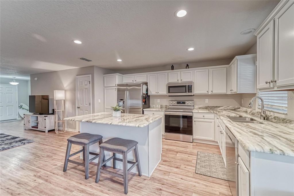 Photo of 13822 Harvestwood Lane, Riverview, FL 33569 (MLS # TB8384638)