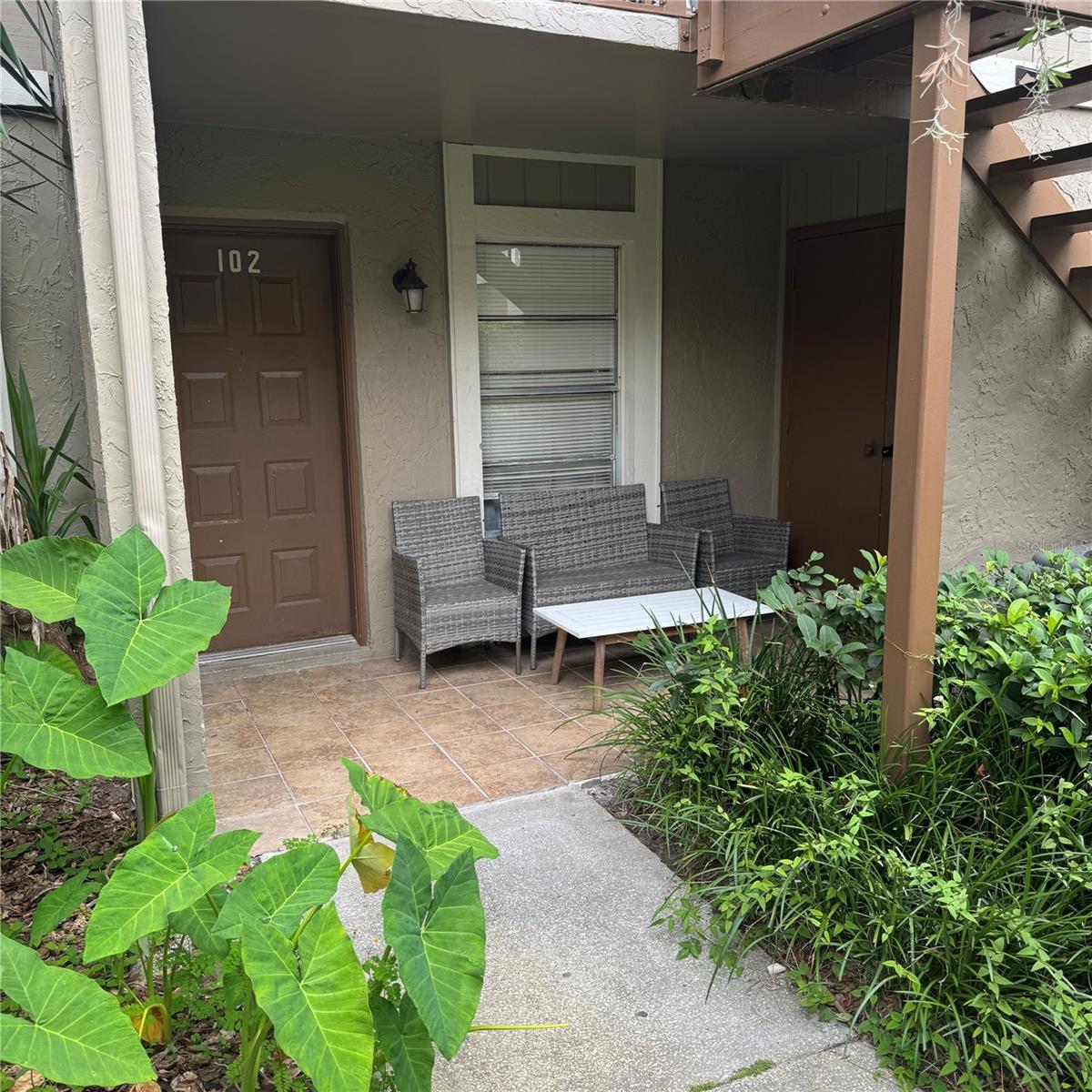 Don’t miss this incredible opportunity to own a 1-bedroom, 1-bathroom condo in a highly sought-after neighborhood on 42nd Street.
This thoughtfully designed unit features an open concept living and dining area, one well-appointed bedroom, and one full bathroom. Enjoy the convenience of a dedicated laundry room with washer and dryer located just off the front porch, offering peaceful views of stunning oak trees. Recent upgrades include interior updates in 2022, and a new HVAC installed in 2023. Residents have access to a range of community amenities, including a swimming pool, racquetball court, and tennis courts. The monthly HOA fee covers water, sewer, trash, exterior and grounds maintenance, and upkeep of all shared spaces and recreational facilities. Ideally situated just minutes from the University of South Florida (USF) and conveniently located on the USF shuttle route. Also, near Advent Health, VA Hospitals, Moffitt Cancer Center, as well as shopping centers, restaurants, and entertainment venues. This condo offers a perfect blend of comfort, convenience, and location. Schedule your private showing today!