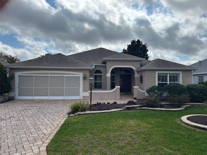 You must see this designer model, Gardenia located in the Village of Glenbrook. Minutes away from shops, grocery stores, banks, restaurants, gas stations & pharmacies. This 3 bedroom, 2 full baths & 2 car garage is being offered TURNKEY/FULLY FURNISHED. Brick paver driveway & sidewalk. Newer roof, 2020. Gutters, large entry & block/stucco exterior finish. Oversize Living Room & Dining Room with laminate wood flooring, volume ceilings, plantation blinds, recessed lights, ceiling fans & crown molding, Gas fireplace in Living Room w/ ceramic logs. Kitchen boasts lots of cabinets, pull-out drawers, Corriane c-tops, Ceramic flooring, Stainless Steel appliances & kitchen nook area. Corriane countertops, stainless steel appliances, plantation shutters, stone, gas fireplace. Large Master Bedroom suite w/ volume ceilings, his & hers walk-in closets, large linen closet, updated shower w/ glass doors. 3rd bedroom does not have closet. Inside laundry room w/ solar tube. Enclosed lanai w/ sliding glass doors & tiled flooring. Call today for your personal tour of this home. Bond paid!