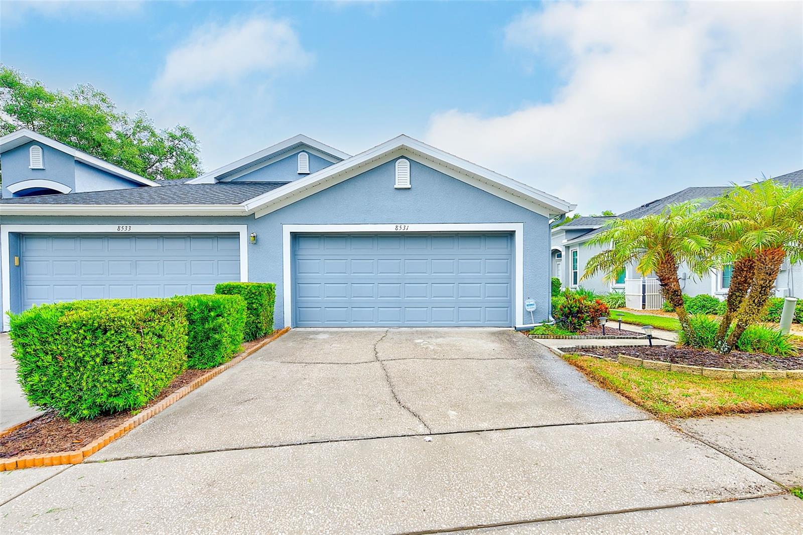 Florida living at its finest! Beautifully maintained villa enjoys 2 bedrooms, 2 baths including oversized 2 car garage with plenty of shelving! A popular Centex built Victoria floor plan features a spacious Living or Great Room & Formal Dining Room & as a BONUS a Flex
room/In Home Office, this 1,484 SF villa offers a very rare private rear patio on a generous lot. Enjoy the wonderful benefits of living within
a community with only 106 lots without having the maintenance worries because lawn care & exterior maintenance is included in the very
affordable HOA dues & NO CDD FEES!!! Exterior has been painted in 2022 (covered by HOA) and roof was replaced in 2020 (covered by HOA). This floor plan features the split floor plan with the Master Suite & UPGRADED En-suite Private Bath & ACCESSIBLE SHOWER & GRANITE in the rear WITH Walk-In CALIFORNIA CLOSET! Bedroom # 2 enjoys California Built-in Closet & Hall Bath is equipped with tub & shower and granite counters in the front of the villa! Home investments include HVAC in 2020; Newer Stainless Appliances in kitchen including the refrigerator, range, dishwasher (2021) & microwave; Washer (2025) & Dryer located also convey! New & stunning lighting fixtures & New ceiling fans w/remotes & all SHUTTER window coverings! Exterior painted (2022) by HOA & Seller freshly painted the interior! With a very comfortable floor plan that affords privacy & space, lots of natural light & provides an open and airy feel. Flexible living spaces connect to the kitchen and depending on ones’ style and needs, the rooms each work well as living, dining and home office. Kitchen enjoys a cozy breakfast nook, closet pantry 42 inch solid maple cabinetry & a breakfast bar. Main living areas & beds have wood flooring. The large primary suite with walk in closet & large upgraded primary bathroom enjoys a separate stand alone accessible Roman shower and vanity with granite counters. Outdoor private open patio! Yard that is HOA owned and maintained by HOA add to the advantage of this special villa with the nicest elevation in the community. With private drive & 2 car garage w/opener, this villa's garage offers plenty of shelving for quietly puttering in the garage! Located in highly regarded Westmont Oaks, one cannot go wrong with the incredibly convenient location - nearby by to excellent retail options such as Costco, Sprouts and many dining choices minutes away in Westpark Village of Westchase, as well as districted to premier public schools, like Westchase Elementary. Westmont Oaks is a gated community that also includes a lovely neighborhood pool and scenic
walk ways with beautiful landscaping throughout; and is 15 minutes from the Tampa International Airport, 25 minutes to downtown Tampa, and about 40 minutes to some of the most world-renowned sweet sugar white sand beaches in sunny Florida! HOA includes landscaping (mowing, pest control, fertilizing), Repairing and/or replacing exterior roof, Paint home exterior, Standard cable package, Annual termite inspection, and Sprinkler System! Treat yourself to the tranquil retreat by the babbling brook on Rocky Creek under the shade of towering oaks. Westmont Oaks, a gated community well known for the shady oak lined streets and nature views & close proximity to the Veteran's Xpress way for easy commutes! Tucked within the boundaries of Westchase & Citrus Park this amazing property is not just affordable but is convenient for all that the Florida Lifestyle has to offer!