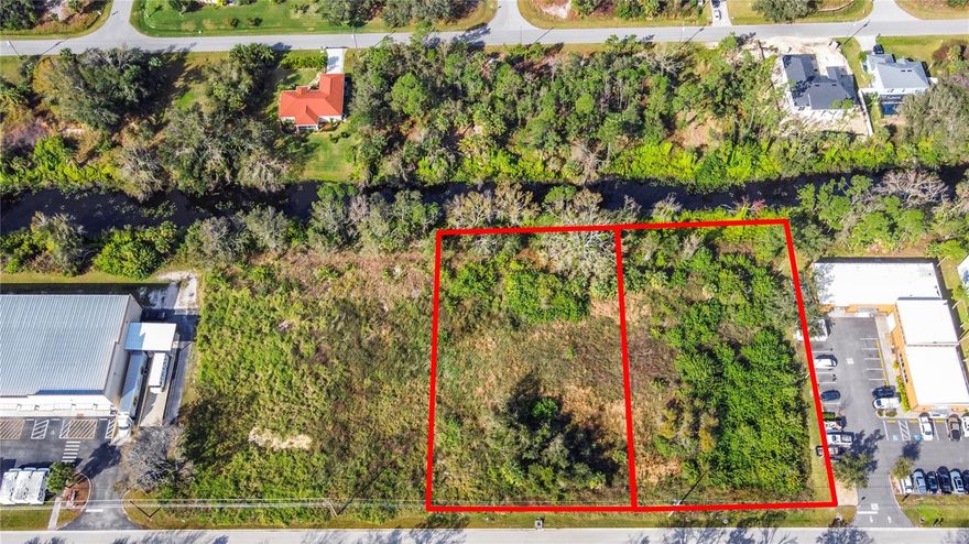 Prime 1.32-acre industrial parcel located in the highly sought-after North Port Park of Commerce, within Activity Center 4 – Panacea, one of North Port’s premier commercial and industrial hubs. This shovel-ready site offers an exceptional opportunity for owner-users, developers, and investors seeking flexible industrial zoning in a rapidly growing market.

Zoned PCDN, the property allows for a wide range of industrial, warehouse, and professional office uses. Warehousing and business or professional office space are permitted by right, providing immediate development potential. The site allows up to 50% lot coverage, with 25-foot front and rear setbacks and 15-foot side setbacks, offering excellent building flexibility for distribution, manufacturing, office-warehouse, or mixed-use industrial facilities.

A canal at the rear of the property provides both functional drainage and an attractive natural buffer, enhancing the site’s usability and visual appeal. Located within the established North Port Park of Commerce, the property benefits from proximity to major transportation corridors, regional employment centers, and expanding residential communities, making it an ideal location for logistics, light industrial, or service-oriented businesses.

A rare opportunity to secure industrial land in one of Southwest Florida’s most strategic growth corridors.