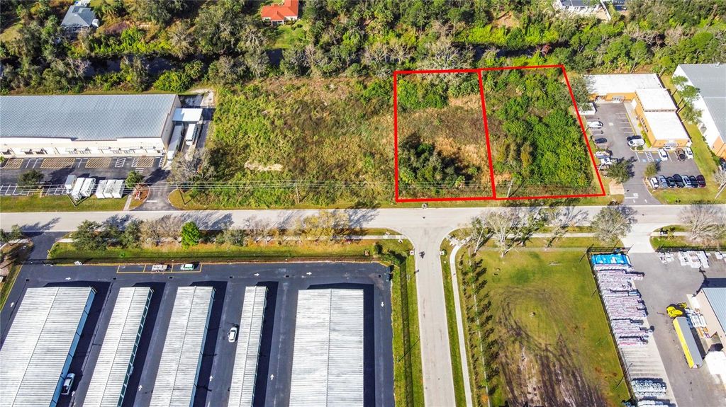Photo of 2725 Commerce Parkway, North Port, FL 34289 (MLS # A4677640)
