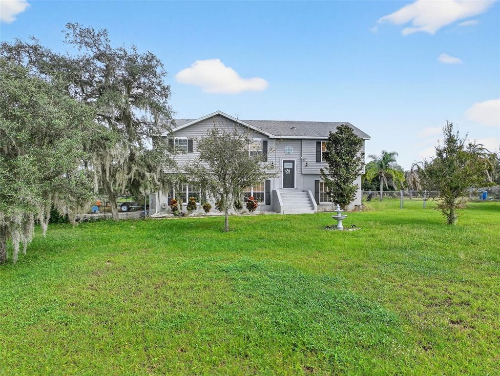 Photo of 301 H L Smith Road, Haines City, FL 33844 (MLS # S5136050)