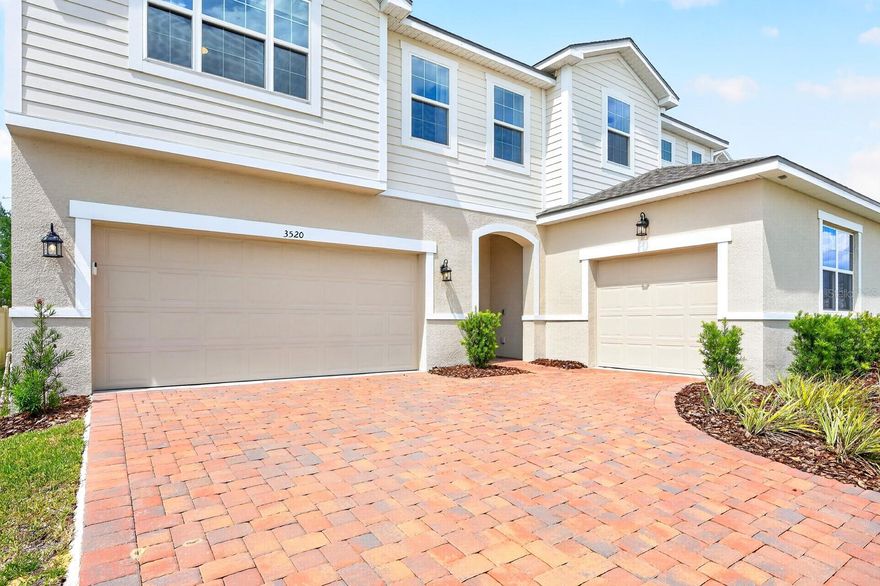 Ask about a lender-provided RATE BUY-DOWN CREDIT on this home //// Welcome to this beautifully maintained 5-bedroom, 3.5-bath home in the sought-after GATED COMMUNITY of Waterbrooke in Clermont, where modern elegance, generous living spaces, and RESORT-STYLE AMENITIES come together perfectly. Built in 2024 and offering over 3,200 SQUARE FEET, this stunning residence still FEELS BRAND NEW and is thoughtfully designed for both everyday comfort and effortless entertaining. From the moment you arrive, the home impresses with its paver driveway, COURTYARD-STYLE 3-CAR GARAGE, and attractive curb appeal. Inside, you’ll find a bright OPEN-CONCEPT LAYOUT enhanced by tile flooring throughout the main living areas and PLANTATION SHUTTERS in the Living Room, Kitchen, and Bedrooms, adding timeless sophistication. The heart of the home is the CHEF'S KITCHEN, beautifully appointed with dove gray cabinetry, under-cabinet lighting, QUARTZ COUNTERTOPS, a designer tile backsplash, built-in double ovens, a cooktop, and an oversized island with breakfast bar seating. High-end touches continue with stainless steel appliances including a SAMSUNG SMART REFRIGERATOR and INNOVATIVE 3-DRAWER DISHWASHER. The Kitchen flows seamlessly into the spacious Living and Dining areas, where REMOTE-CONTROLLED BLINDS frame the sliding glass doors and lead to the covered patio and backyard beyond. The Primary Suite is conveniently located on the main floor, creating a PEACEFUL RETREAT complete with large windows for NATURAL LIGHT, a spacious walk-in closet, and a beautifully designed EN SUITE BATH with dual sinks, a step-in shower, and private water closet. The first floor also offers incredible flexibility with 2 BONUS ROOMS, ideal for a formal Dining Room, playroom, home gym, media room, or additional workspace. A half bath and Laundry Room—with a SAMSUNG SMART WASHER AND DRYER plus additional storage shelving—complete the main level. Upstairs, you’ll find FOUR GENEROUSLY SIZED BEDROOMS, two of them connected by a convenient JACK-AND-JILL BATHROOM, along with a roomy loft area featuring REMOTE-CONTROLLED AUTOMATIC BLINDS, creating the perfect space for a media room, game room, or second living area. Step outside and enjoy relaxing evenings on the covered paver patio overlooking the SPACIOUS, FULLY FENCED BACKYARD, enclosed with a NEW VINYL FENCE for added privacy and plenty of room for entertaining, pets, or outdoor fun. Residents of Waterbrooke enjoy a LOW HOA with exceptional RESORT-STYLE AMENITIES, including a sparkling community pool, fitness center, playground, park, and dog park, all within a beautifully maintained neighborhood. Located in the rapidly growing Clermont area, this home offers EASY ACCESS to shopping, dining, and entertainment, as well as NEARBY ATTRACTIONS like Downtown Clermont, the scenic Lake Louisa State Park, and the popular West Orange Trail. CONVENIENT ACCESS to major roadways also places WALT DISNEY WORLD RESORT, Orlando, and surrounding Central Florida destinations within easy reach. With its luxury finishes, VERSATILE FLOOR PLAN, and outstanding community amenities, this Waterbrooke home offers an exceptional opportunity to enjoy elevated Florida living in a NEARLY NEW HOME designed for today’s lifestyle. Act quickly—this GEM won't last long!