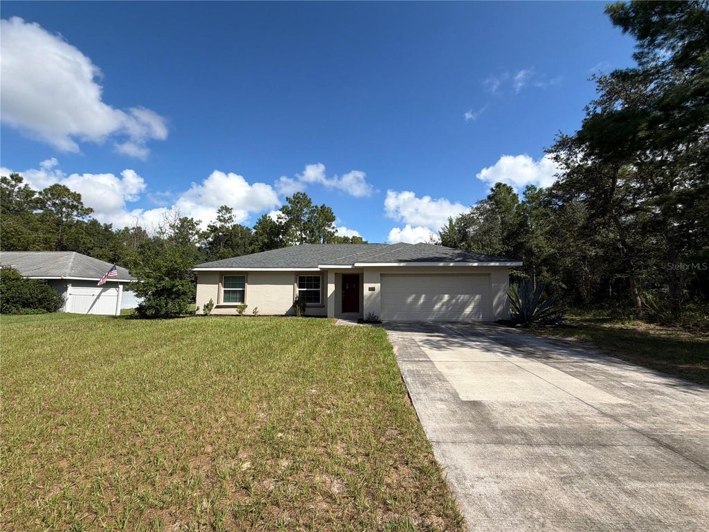 Photo of 5209 SW 128th Place, Ocala, FL 34473 (MLS # O6444673)