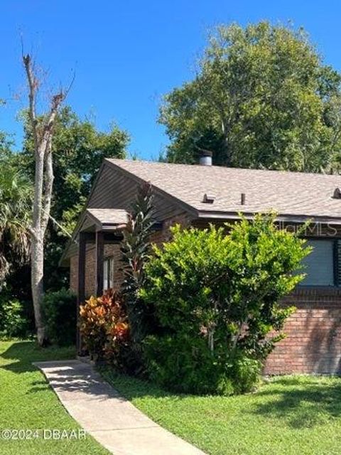 Photo of 1580 Revere Lane, Daytona Beach, FL 32117 (MLS # V4948182)