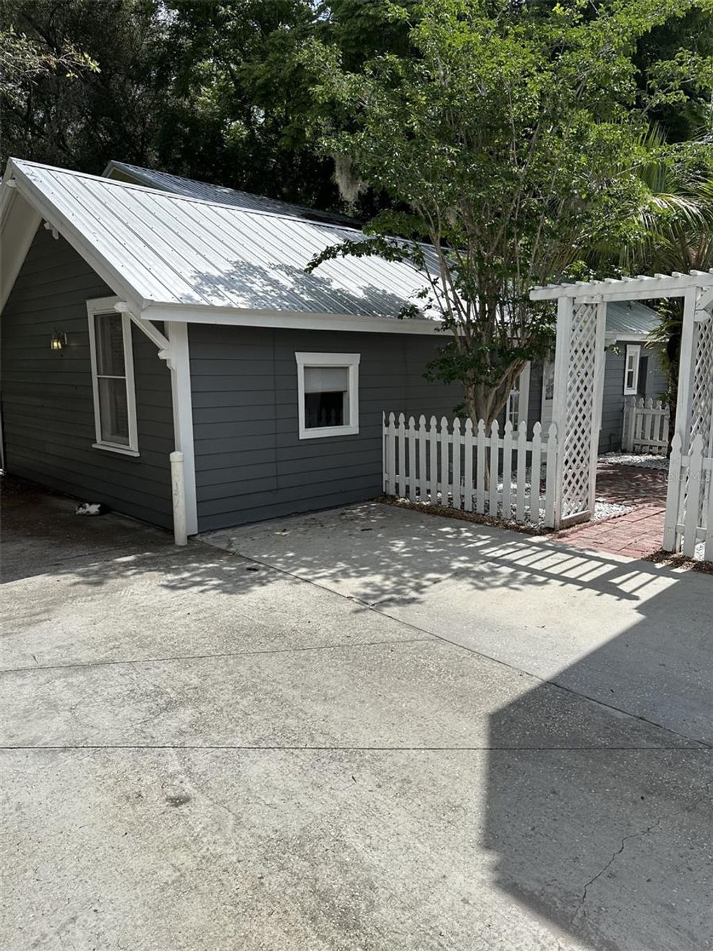 Photo of 205 E Voorhis Avenue, Deland, FL 32724 (MLS # GC536702)