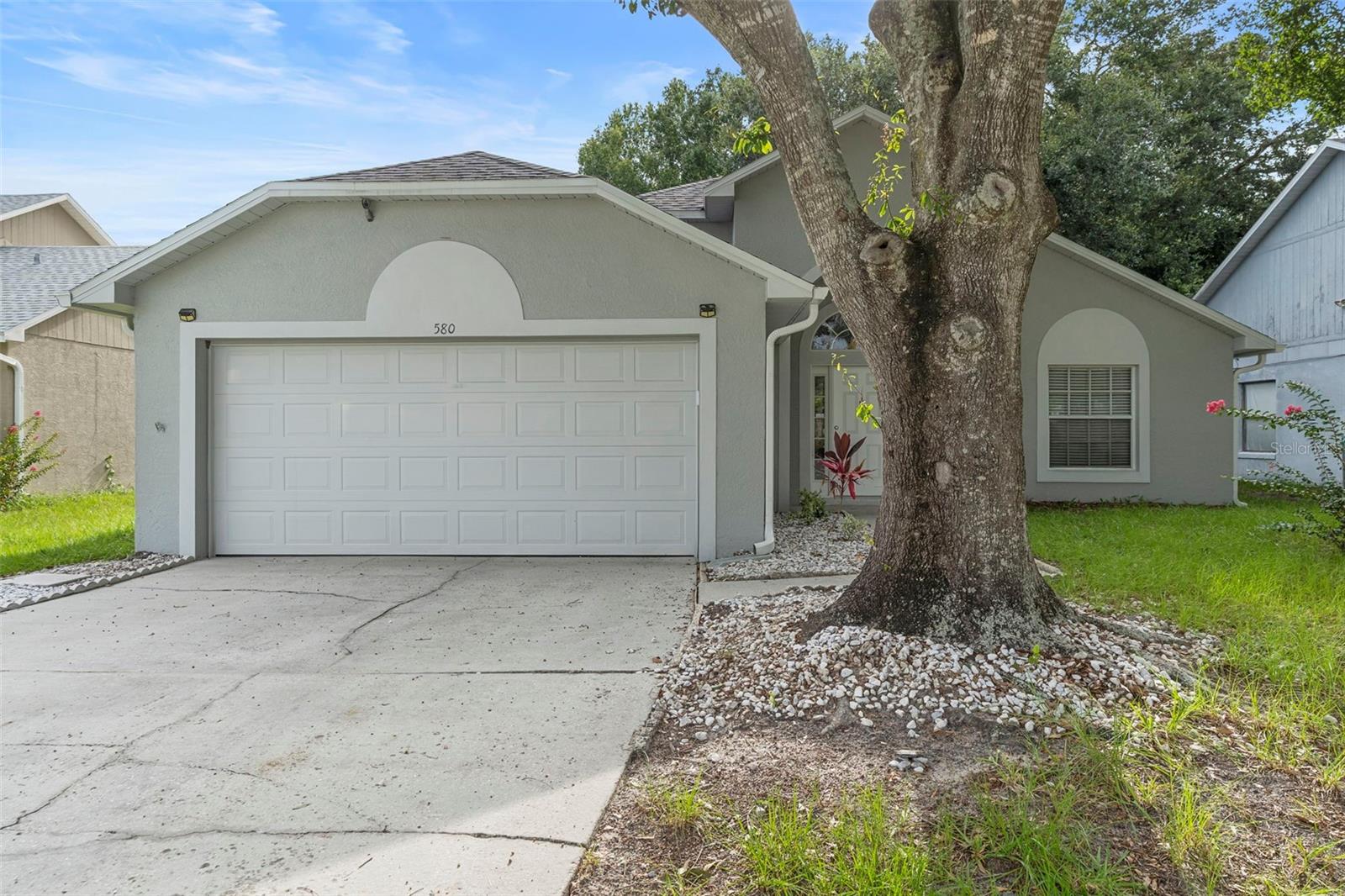 Welcome to Valencia Place! This well-maintained 3-bedroom, 2-bath home offers a spacious layout with an attached 2-car garage, fully fenced backyard, and rear patio—perfect for relaxing or entertaining. The open kitchen overlooks a generous great room featuring tile flooring and sliding glass doors that lead to an enclosed porch.
The primary suite is spacious enough to comfortably fit a king-size bed and additional furniture. A conveniently located interior laundry room sits just off the kitchen. Enjoy added privacy with no immediate rear neighbors and extra space behind the home.
Located in a quiet neighborhood with easy access to major roadways, shopping, dining, and top-rated schools. Just a short drive to UCF, Full Sail University, Downtown Orlando, and Winter Park. A must-see for anyone seeking comfort and convenience!