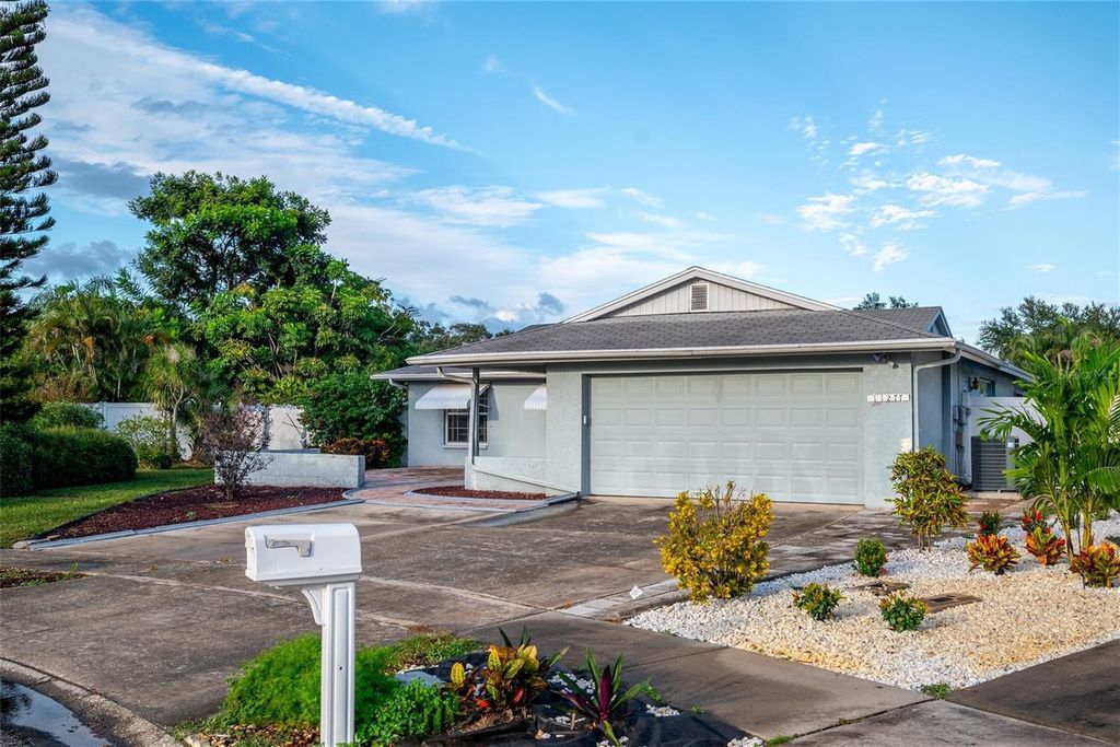 Photo of 11277 Sol Vista Drive, Largo, FL 33774 (MLS # TB8436714)