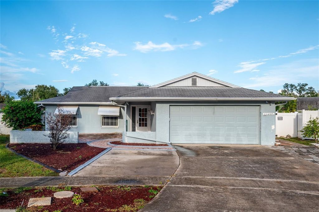 Photo of 11277 Sol Vista Drive, Largo, FL 33774 (MLS # TB8436714)