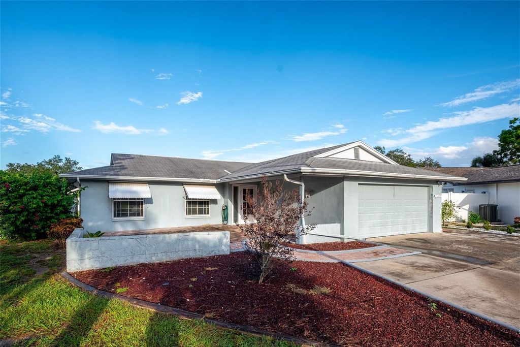 Photo of 11277 Sol Vista Drive, Largo, FL 33774 (MLS # TB8436714)