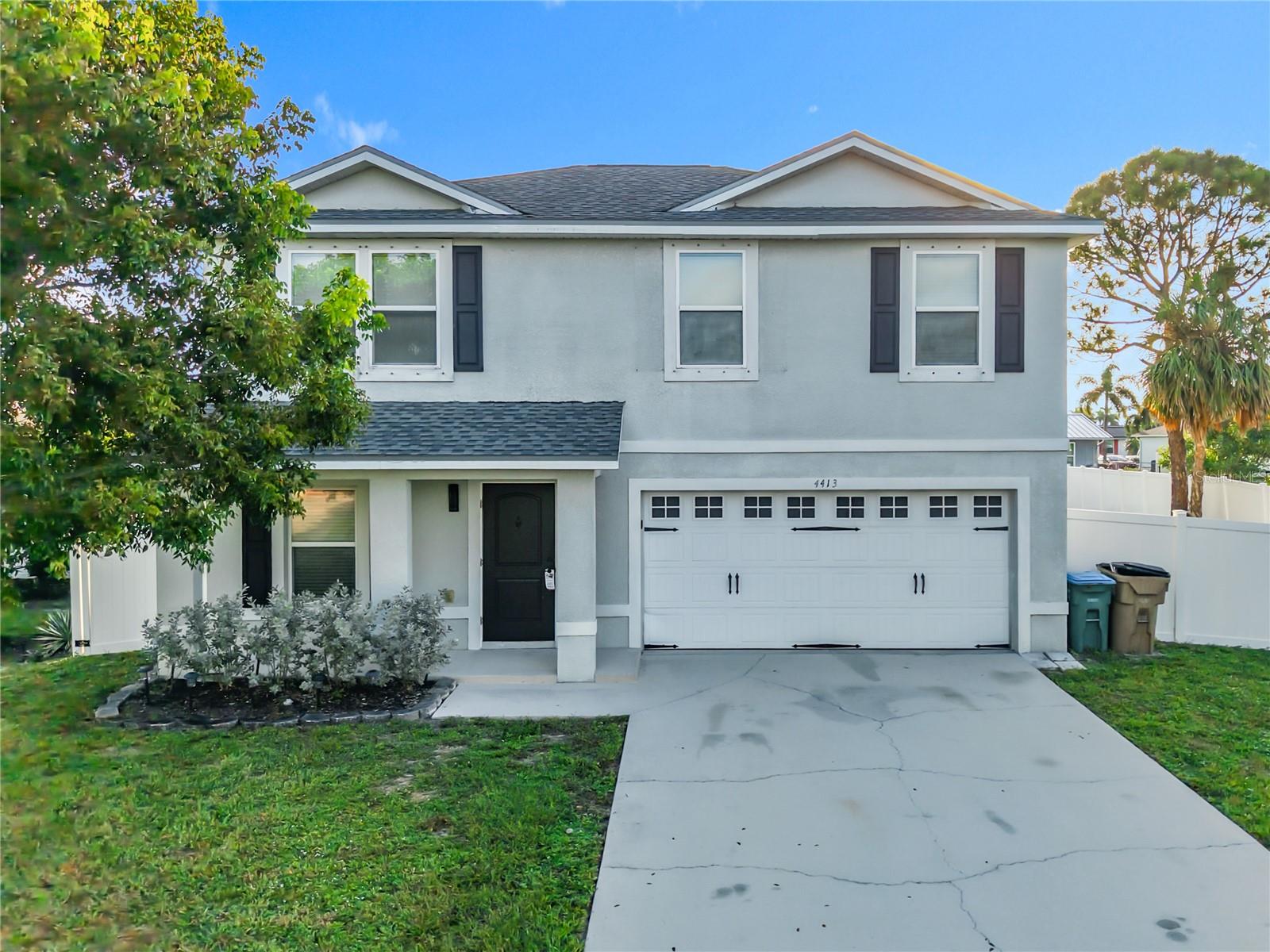 Welcome to this beautiful two-story home in Cape Coral featuring 3 bedrooms and 2.5 bathrooms, perfectly situated on an oversized fenced lot offering privacy and space for outdoor living. The property includes a covered back patio, ideal for relaxing or entertaining. The roof was replaced in 2023, providing peace of mind for years to come. The first floor showcases elegant laminate flooring, while the second floor is comfortably carpeted. The modern kitchen comes fully equipped with all appliances, and the washer and dryer are conveniently located in a first-floor closet. The spacious living room features a built-in entertainment unit, and a half bathroom on the main floor adds extra convenience. This home combines comfort, functionality, and style — a perfect opportunity to enjoy the Cape Coral lifestyle.