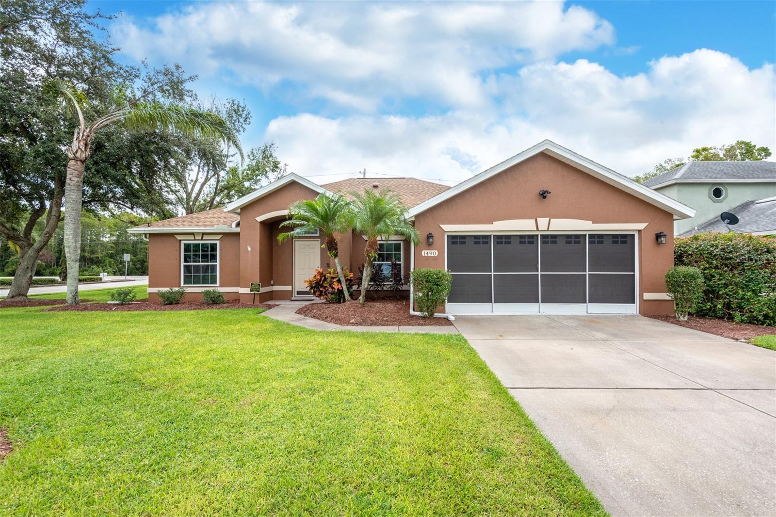Welcome to 1490 Surrey Park Dr, a beautifully updated POOL home perfectly situated on a spacious corner lot in the sought-after Vineyards Subdivision. Featuring a split floor plan with 3 bedrooms, 2 bathrooms, and a 2-car garage, this home combines modern upgrades with functional design for everyday living and entertaining. The owners have lovingly cared for every inch of this property, ensuring that no detail has been overlooked.
Inside, tall ceilings, wood-look tile flooring, and fresh light fixtures create a bright and welcoming atmosphere. The expansive living room is perfect for relaxing, while the dedicated dining area is ready for family gatherings or hosting friends.
The chef’s kitchen is a true highlight, boasting sleek quartz countertops, stylish gray soft-close cabinets, a gas stove, pull-out storage, and a generous pantry.
Both bathrooms have been fully remodeled with high-end finishes, transforming them into spa-like retreats. The primary en-suite offers a double vanity, large soaking tub, and a separate shower.
Step outside to your private oasis with an inviting screened-in saltwater pool with a cover for year-round enjoyment. The pool is easy to maintain with a robot vacuum and added privacy screen ensures complete relaxation.
New windows and hurricane shutters provide added peace of mind. The garage also includes a screen for comfort and functionality. Convenience continues with a central vacuum system and gutter guards for effortless cleaning.
Additional features include a whole-home water filtration system and an exterior shed for extra storage. Be sure to check out the video, 3D tour, and floor plan to fully experience everything this home has to offer!
This home checks every box with stylish updates, thoughtful details, and outdoor living at its best. Don’t miss your chance to make it yours!