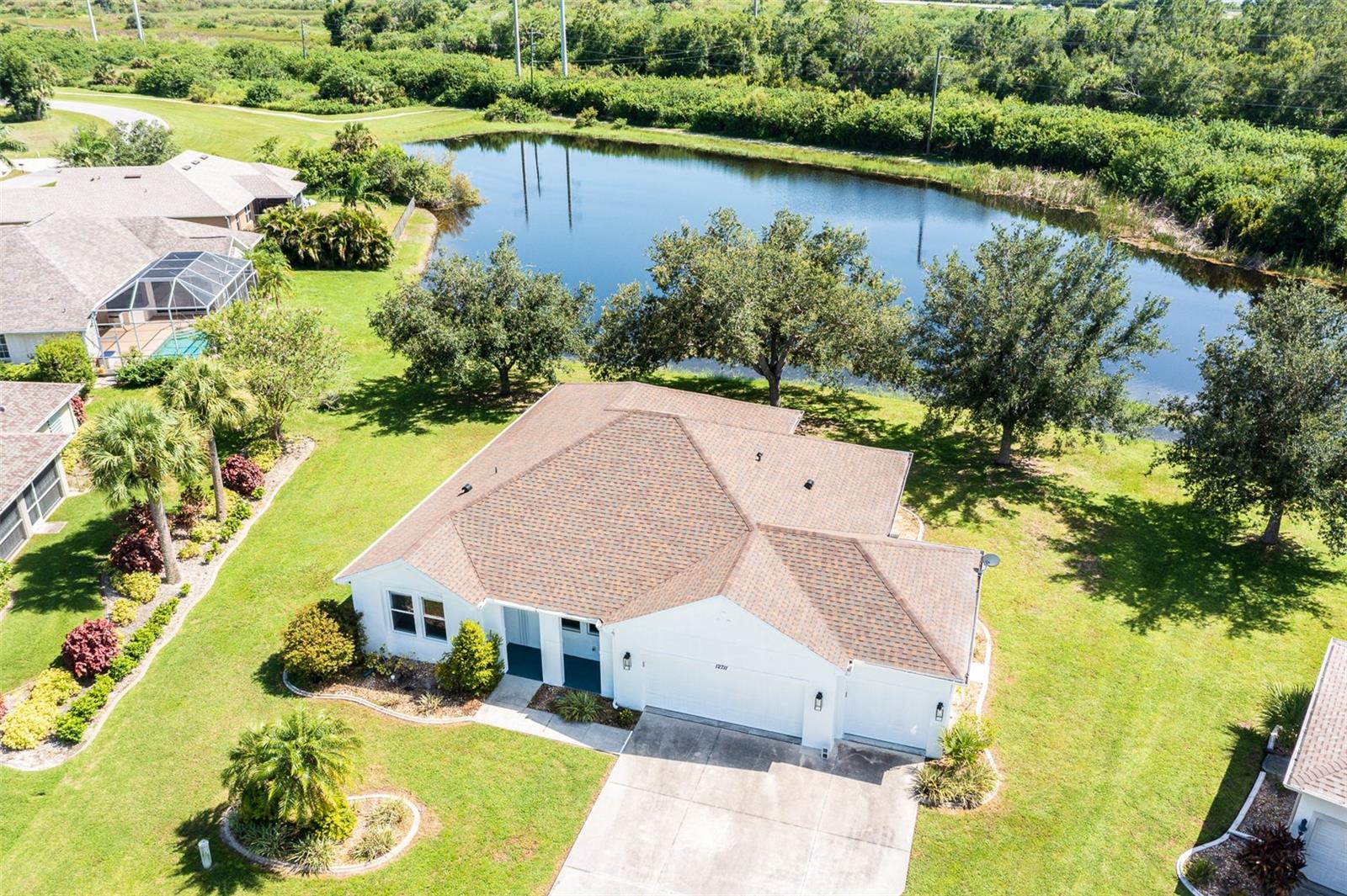 BACK ON MARKET! Buyers didn't get qualified for VA loan before inspection. Motivated Sellers. Introducing a renovated Gem at Lake Suzy community. Situated by the water pond and stunning sunsets views. This beautifully updated 3-bedroom, 2-bathroom home with a spacious 3-car garage, nestled in the highly sought-after Lake Suzy community. A perfect blend of modern style and everyday functionality, this home is move-in ready and sure to impress.
Step inside to find luxury vinyl plank (LVP) flooring throughout, complemented by fresh interior paint that fills each room with light and warmth. The kitchen is a standout, featuring charming, freshly painted solid wood cabinets and new countertops that tie the space together with style and practicality.Important updates have already been taken care of, including a new roof and a serviced HVAC system — giving you peace of mind and comfort year-round. Outside, enjoy the serene backyard setting, perfect for unwinding or entertaining, with tranquil views near the water. Whether you're sipping morning coffee or watching the sunset, this peaceful space feels like a personal retreat.