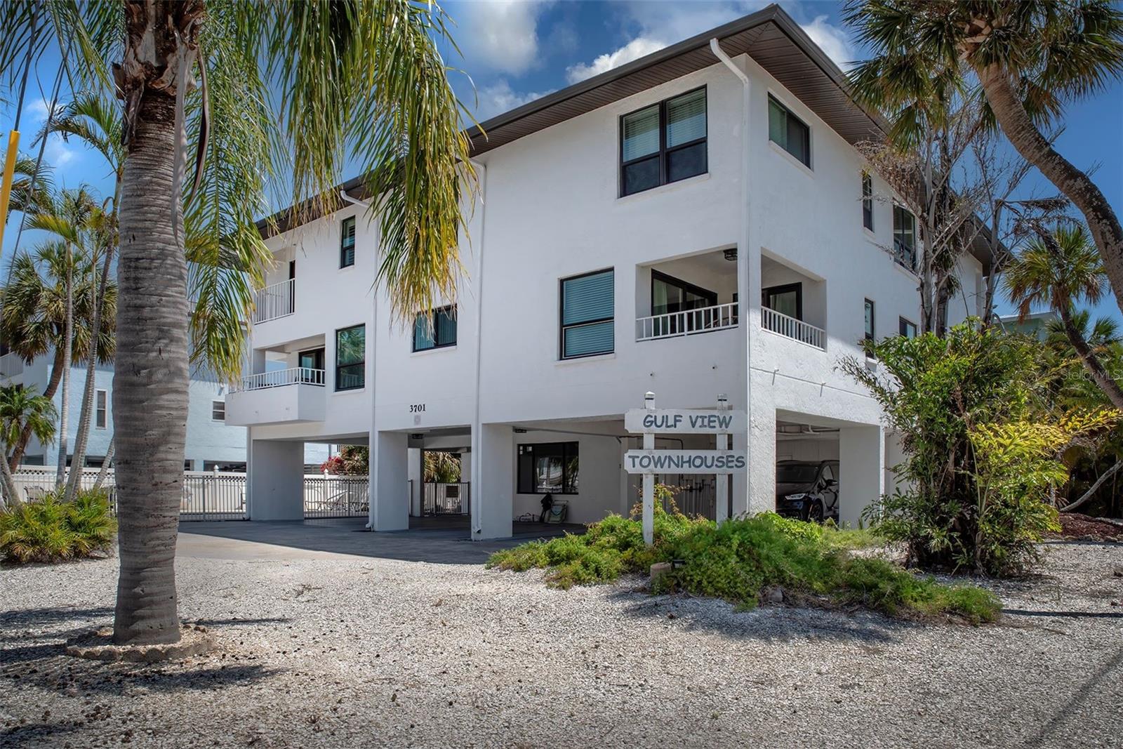 Beautiful TURN KEY Condo Steps from Anna Maria Island’s Sugary Beaches! Welcome to your coastal dream home! ONLY 4 UNITS TOTAL IN THIS BUILDING! Just a short stroll to the sugary sands of Anna Maria Island and only 3 blocks to the public beach — home to a popular café, lively tiki bar, and don't forget the famous Skinny Burgers across the street! Property Highlights: 2 covered parking spaces, Heated pool, elevated unit with bedrooms and full bathrooms on the second floor, convenient half-bath on the main living area — perfect for entertaining, 2 private balconies to enjoy the relaxing Gulf breeze, sits on a peaceful NO THROUGH STREET bordered by parks — with a scenic stroll to the beach, updated kitchen and bathrooms featuring high-quality upgrades, porcelain tiles and exquisite lighting. Enjoy your morning coffee or evening wine while taking in breathtaking sunsets from your private balconies. This condo offers tranquility and ease without through traffic, making getting in and out of the property a breeze. Lovingly maintained by the owners (and not rented in years), this home reflects creativity and care throughout every update which was done . For investors, there’s an extra-large owner’s closet under the indoor staircase and with the SHORT-TERM RENTAL ALLOWANCES it makes this property an excellent investment opportunity! Don't miss this rare opportunity to own a slice of paradise on Anna Maria Island where you can park your car and walk or bike to everything you could possibly need!