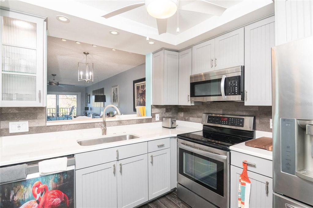 Photo of 1430 Heather Ridge Boulevard #202, Dunedin, FL 34698 (MLS # C7521862)