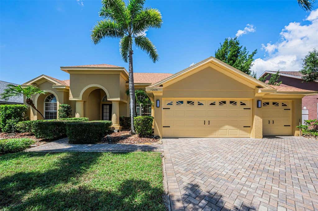 Photo of 1259 Paradise Lake Drive, Tarpon Springs, FL 34689 (MLS # TB8537238)