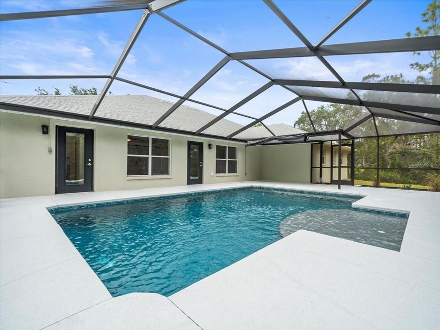 One or more photo(s) has been virtually staged.

Fully remodeled 4-bedroom pool home with office and over 3,000 sq ft on a quiet cul-de-sac in Sugarmill Woods. This spacious 4-bedroom, 3-bathroom home features two ensuite bedrooms and a dedicated office, offering flexibility for guests, multi-generational living, or working from home.

The open-concept design connects a large great room, formal dining area, and a beautifully updated kitchen featuring new cabinetry, quartz countertops, premium GE appliances, and a wine refrigerator, creating the perfect space for entertaining.

The primary suite offers a spa-like retreat with a freestanding soaking tub, glass walk-in shower, and dual quartz vanities. Two additional bedrooms feature private ensuite bathrooms, providing comfort and privacy for family or guests.

Step outside to a screened saltwater pool with birdcage enclosure, surrounded by professionally landscaped grounds that create a peaceful outdoor setting ideal for relaxing or entertaining.

Major updates include NEW ROOF (2024), AC (2020), HOT WATER HEATER (2025), luxury plank vinyl flooring, recessed lighting, updated ceiling fans, and fresh interior paint. A dedicated laundry room with quartz countertops and new cabinetry adds additional convenience.

Located in the highly desirable Sugarmill Woods community near golf courses, nature trails, shopping, and the Gulf Coast, this move-in-ready pool home offers space, upgrades, and lifestyle in one exceptional property.
 Seller may consider Bitcoin (BTC), Ethereum (ETH), or USDC, subject to conversion to U.S. Dollars at closing and standard Florida title and escrow requirements