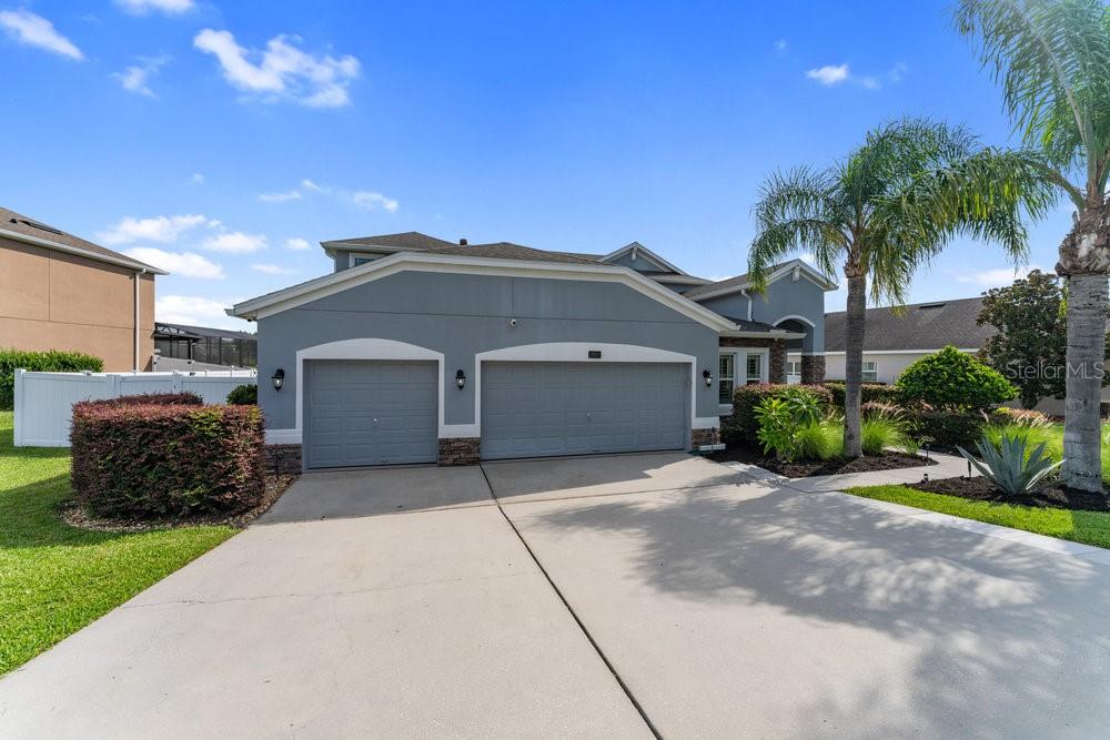 LOCATED IN THE PRESTIGIOUS COMMUNITY OF HAMMOCK POINTE IS THIS MAGNIFICENT RESIDENTAIL MASTERPIECE. With almost 2,800 living sq ft & 5 bedrooms 3.5 baths, the floor plan lends itself to casual, yet elegant, living. The master wing on the first floor features a spa-like bath with jacuzzi tub, dual vanities, a designer shower, a custom walk-in closet, plus a second walk in closet. A truly luxurious kitchen features a designer backsplash, large center island with plenty of storage, a gas stove with double ovens, 42" wood cabinets, stainless steel appliances, quartz countertops, a walk-in pantry, & a breakfast bar. The formal dining room is huge & has expansive windows for natural lighting plus a separate area for an office. The living area downstairs is spacious and has picturesque views of the lanai. Family & friends have plenty of privacy on the second floor where there is a large loft with built-in desks, a 2nd master bedroom with a private ensuite & walk in closet, plus 3 additional bedrooms. The outdoor area is truly exceptional with an expansive covered lanai offering abundant room for hosting gatherings. The exquisite pool was added in 2020 & has a gas heater & huge pool deck. This home has white plantation shutters throughout. The backyard is completely fenced. Hammock Pointe has a resort style pool, playground, and a cabana. This development is located minutes from the turnpike, downtown Clermont, shopping, & dining. NO PETS ALLOWED!!