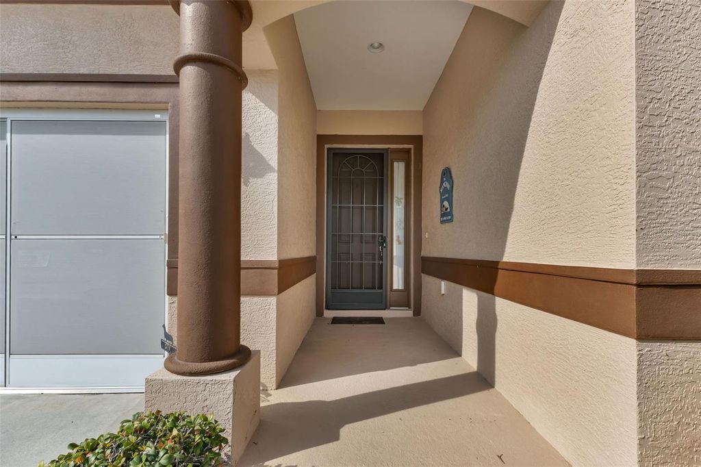 Photo of 1809 Knights Bridge Trail, Port Charlotte, FL 33980 (MLS # C7516708)