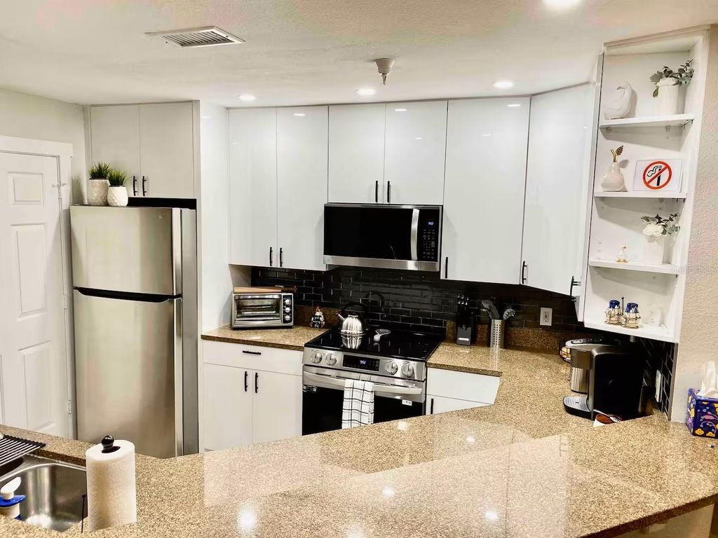 Photo of 1238 S Missouri Avenue #103, Clearwater, FL 33756 (MLS # TB8460270)