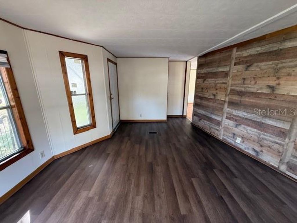 Photo of 10859 SE 131st Place, Ocklawaha, FL 32179 (MLS # S5139805)