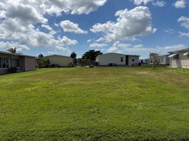 Vacant lot in a vibrant 55+ community located near the boat ramp and across from the La Casa-owned pristine 40 acres! La Casa offers the ultimate Florida lifestyle. We have 974 home sites nestled among a variety of native trees with spacious common grounds surrounding our eight lakes. La Casa is located between Sarasota and Fort Myers, and is a boater's dream with access to the Gulf of Mexico. It is convenient for shopping, sightseeing, golfing, fishing, and boating, as well as all the culture and elegance the Southwest Florida area is noted for. La Casa may have the best pools in the area. Our crown jewel is an extremely large, 40 X 60-foot swimming pool that is kept at a perfect 87 degrees. Our smaller 20 x 40 pool is quietly nestled between the clubhouse and the Activity Building. Both pools have adjacent hot tubs which are ideal for soaking muscles that are tired from golfing or tennis. Wireless Internet (Wi-Fi) is available at the Clubhouse, Activity Building, and Recreation Hall area where these pools & spas are located, so you can catch some rays while you catch up on your email! Sound enticing? Come for a visit to this self-contained oasis and see for yourself why La Casa is the ultimate destination for both snowbirds and year-round residents!