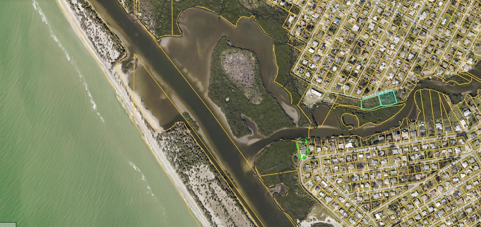 Exceptional opportunity in Venice, FL! Two adjoining parcels on Yacht Club Drive, totaling approximately 1.3 acres, are now available for sale together. Nestled in a quiet neighborhood just off the Intracoastal, these lots offer a rare combination of privacy, natural beauty, and convenience. The property features creek frontage with water access and serene views, along with a partial river view from the rear. With nearly an acre and a half of land, the combined parcels provide ample space for a custom estate home. Located near Venice’s charming downtown, beaches, marinas, and dining, this property delivers both tranquility and accessibility. Whether you’re seeking a waterfront retreat, investment property, or future building site, these lots present an excellent opportunity in one of Sarasota County’s most desirable areas. Living in South Venice also gives you the option to join the communities private beach ferry and boat ramp. $180 a year for beach access & $150 a year for the boat ramp. No mandatory HOA.