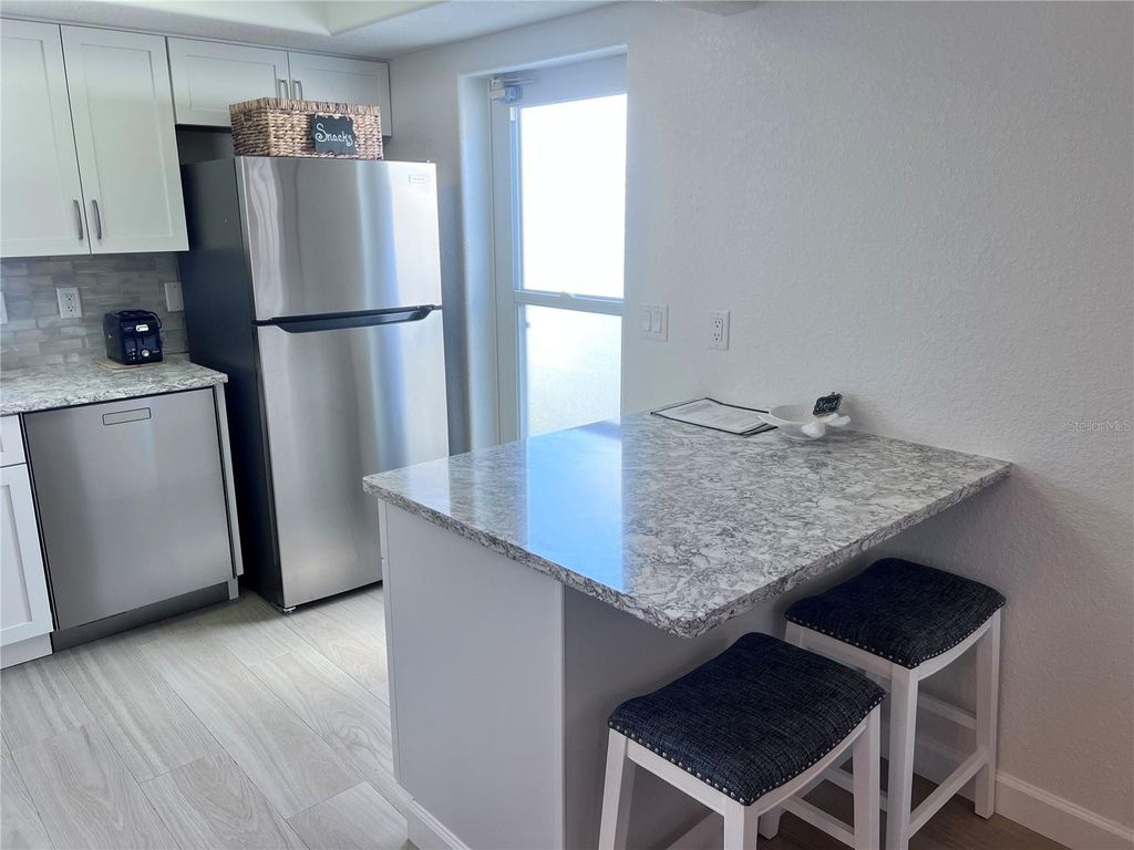 Photo of 6154 Midnight Pass Road #A11, Sarasota, FL 34242 (MLS # TB8468652)